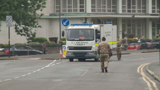 Bomb disposal unit preparing to move a WWII unexploded bomb from a construction site in Birmingham.