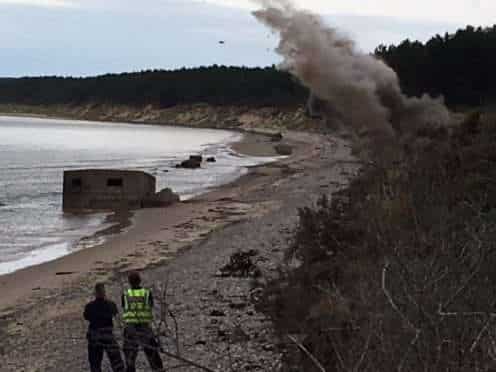 Blast of an explosion to destroy a WWII artillery projectile which was found at a Forres Farm in Scotland.