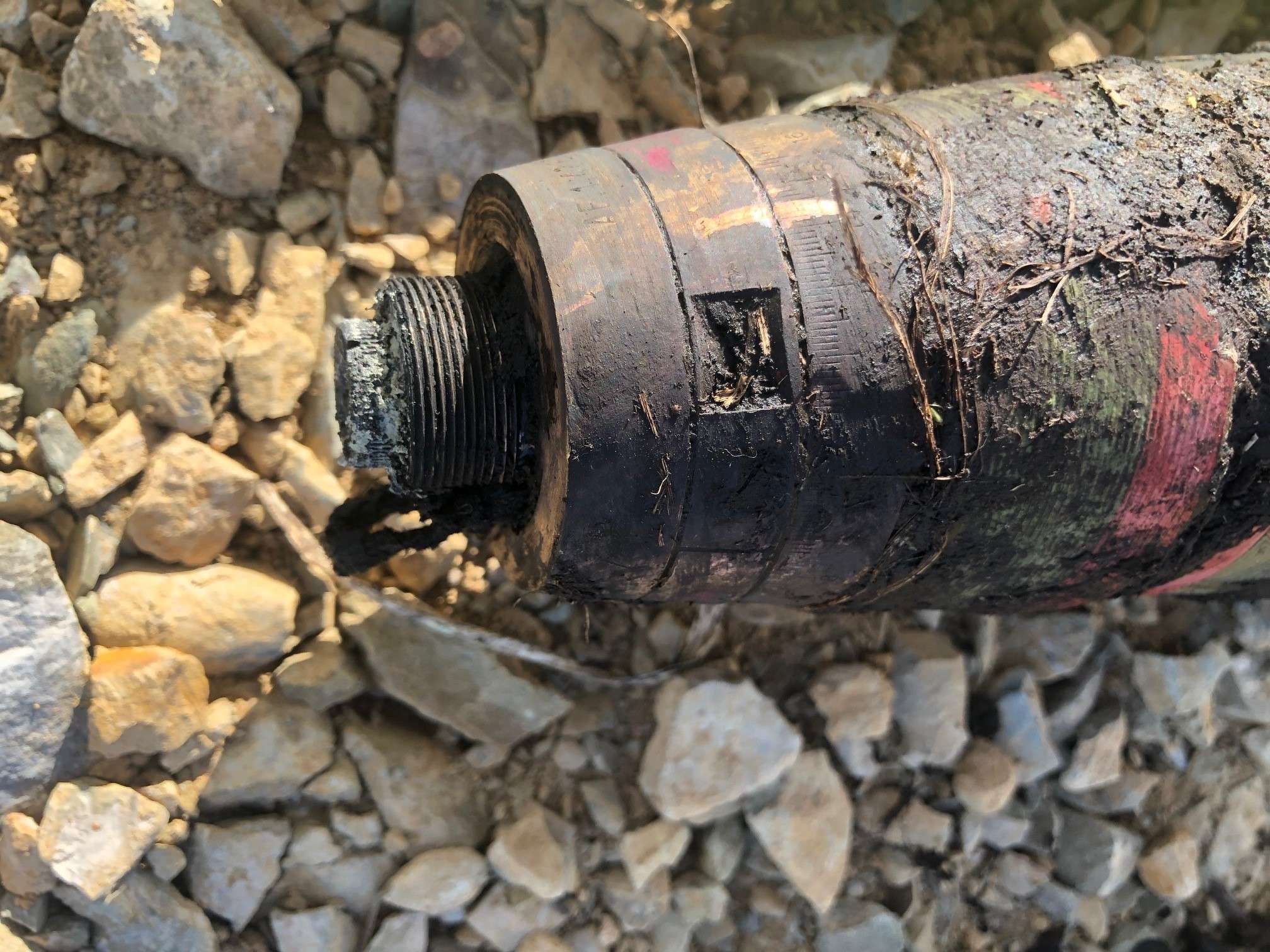 Close-up image of the fuse from a 25lb smoke projectile which was recovered from a Scottish wind farm development by 1st Line Defence.
