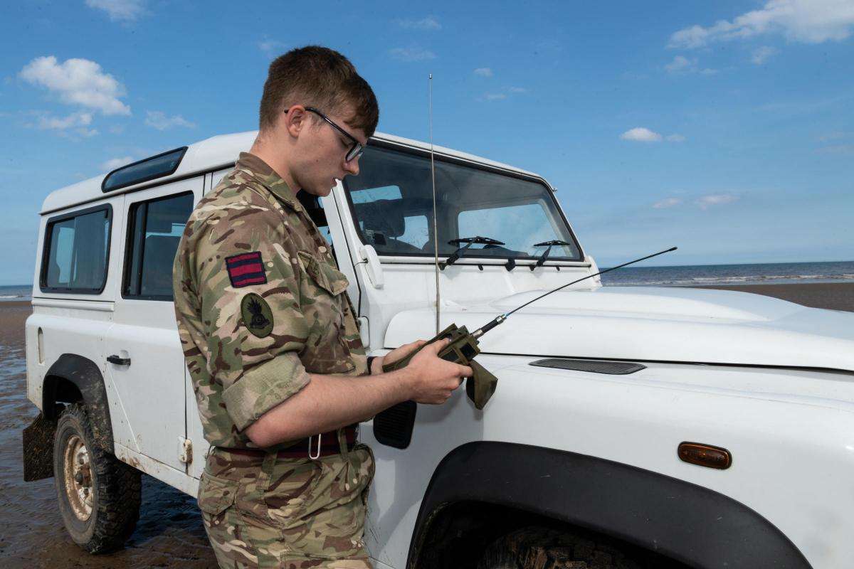 Military personal coordinating controlled explosions of unexploded ordnance discovered on the beach at Cowden Sands in Yorkshire. Image source: Gazette & Herald