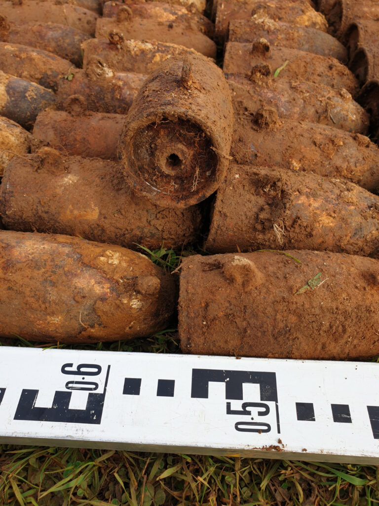 Close-up image of several 10lb & 11.5lb WWII Practice bombs