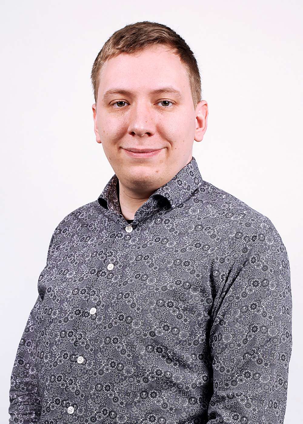 Head shot of Alex, Research & QA Manager at 1st Line Defence