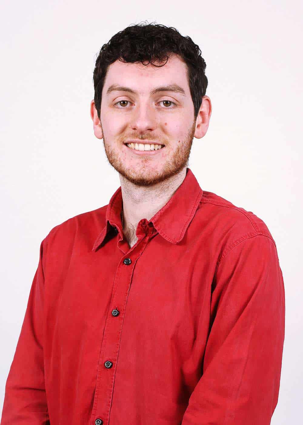 Head shot of Jake, Senior Project Researcher & Training Coordinator at 1st Line Defence