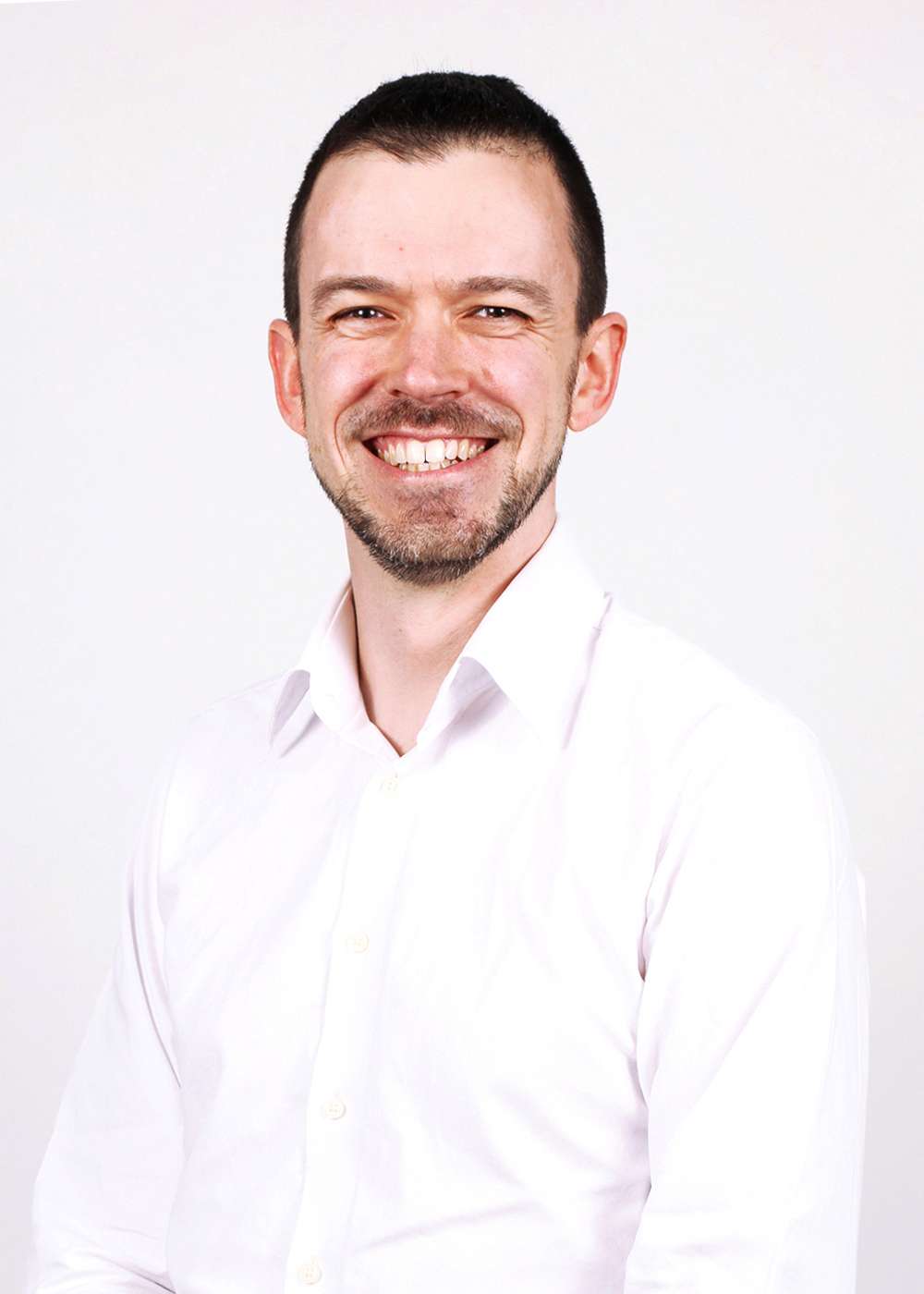 Head shot of Phil, Director of Research & Marketing at 1st Line Defence