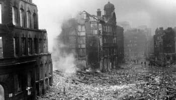 Damage caused to Cannon Street in Manchester after a bombing raid on Christmas Eve, 1940