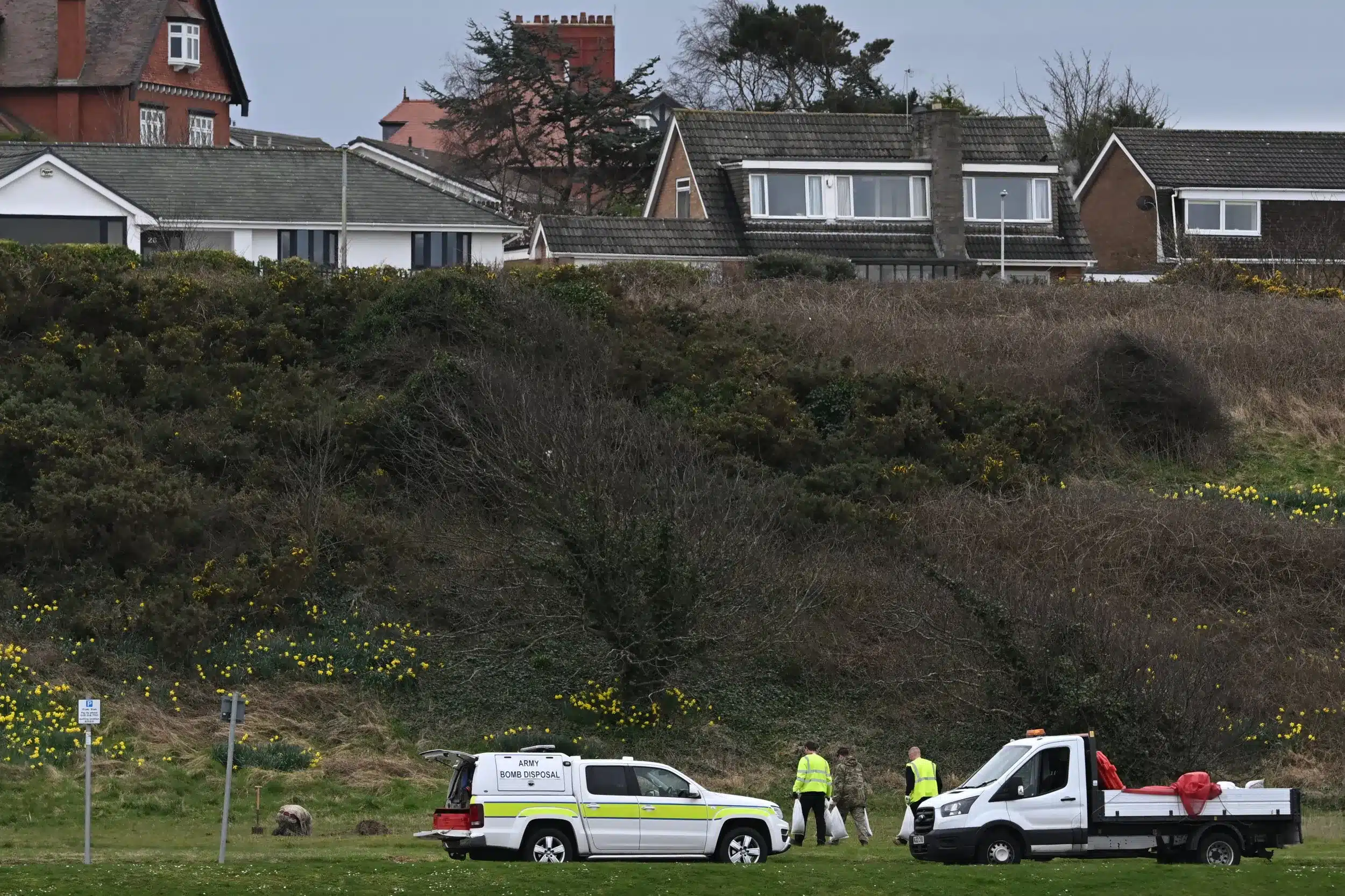 Army Explosive Ordnance Disposal (EOD) team preparing an item of LIVE WWII Unexploded Ordnance (UXO) to be detonated at New Brighton in Merseyside.