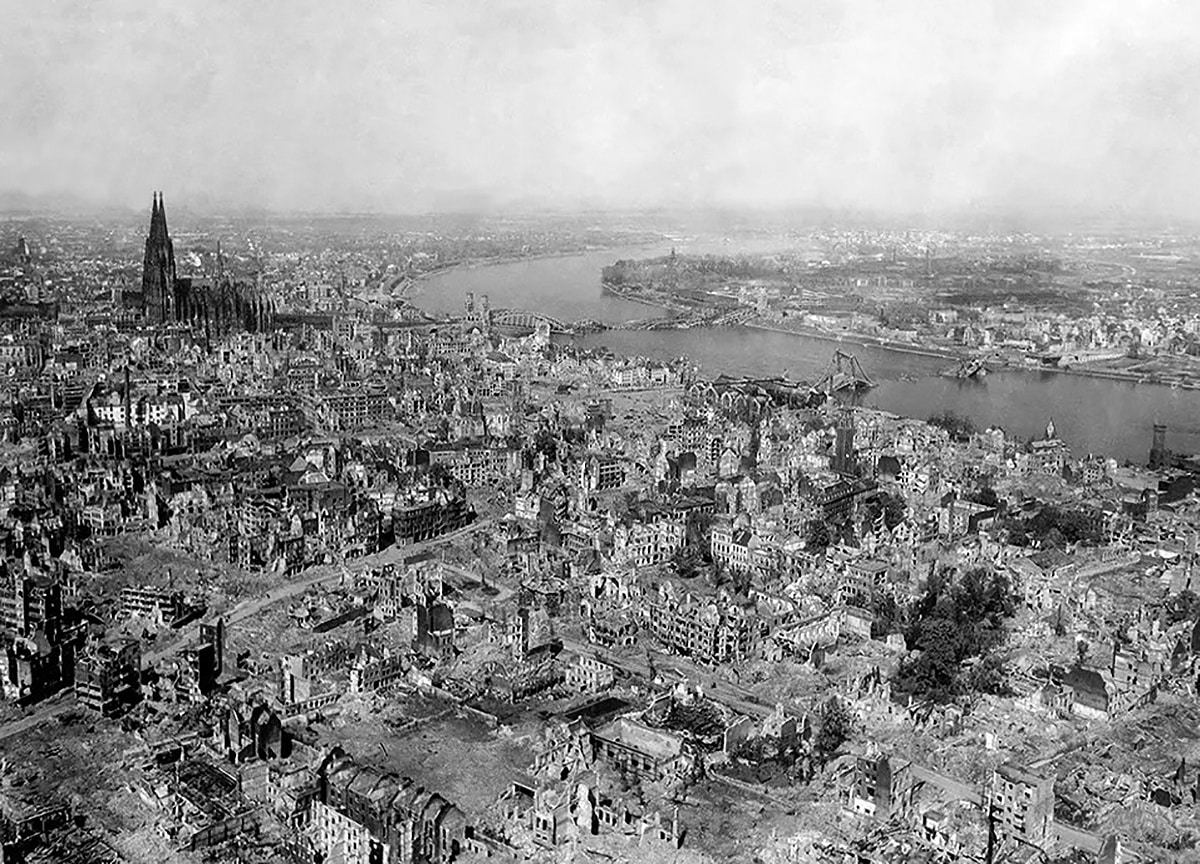 Spires of the cathedral standing amid the ruins of Cologne, Germany – 1945.