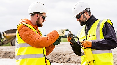1st Line Defence operatives investigating a suspicious object for UXO risk on a construction site in the UK