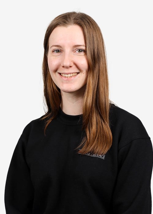 Headshot of Maddie, Operations Manager at 1st Line Defence